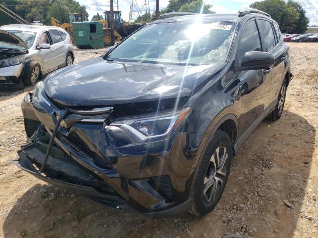 Photo 2 from auction – 2018 TOYOTA RAV4 LE with VIN 2T3ZFREV8JW475214