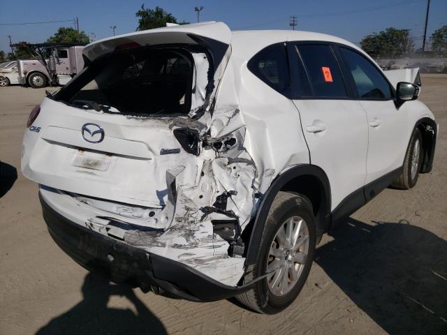 Photo 4 from auction – 2014 MAZDA CX-5 TOURI with VIN JM3KE2CY0E0427880