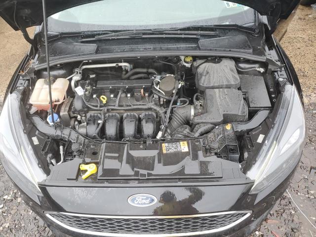 Photo 7 from auction – 2015 FORD FOCUS SE with VIN 1FADP3F27FL381351
