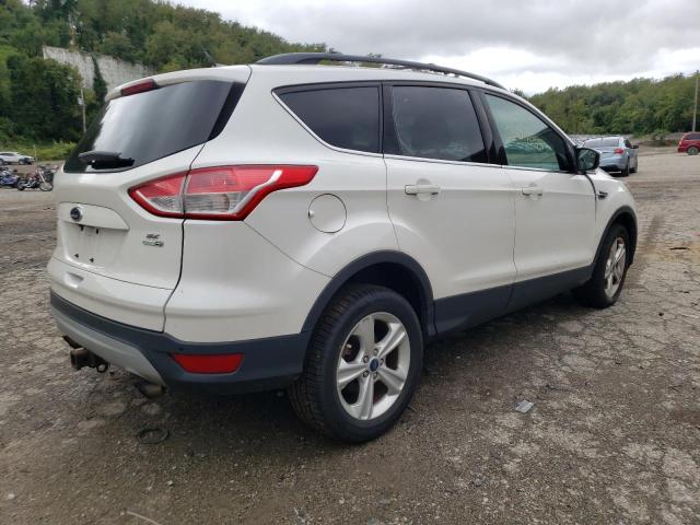 Photo 4 from auction – 2014 FORD ESCAPE SE with VIN 1FMCU9G91EUE48771