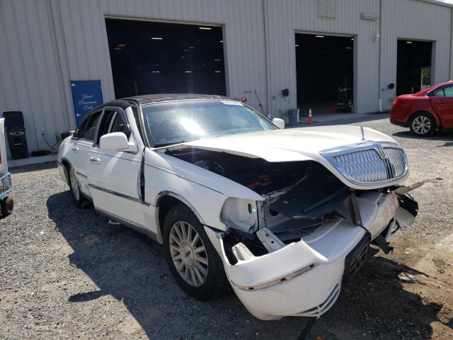 Photo 1 from auction – 2004 LINCOLN TOWN CAR U with VIN 1LNHM83W44Y678534