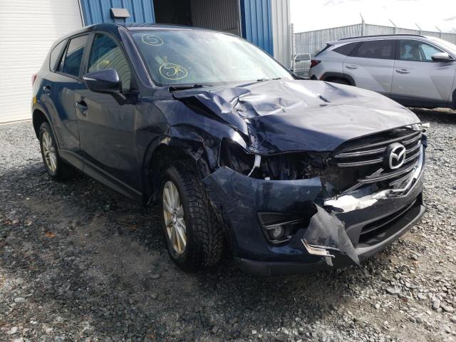 MAZDA CX-5 TOURI 2016 with VIN JM3KE4CY7G0820113 - Photo from auction