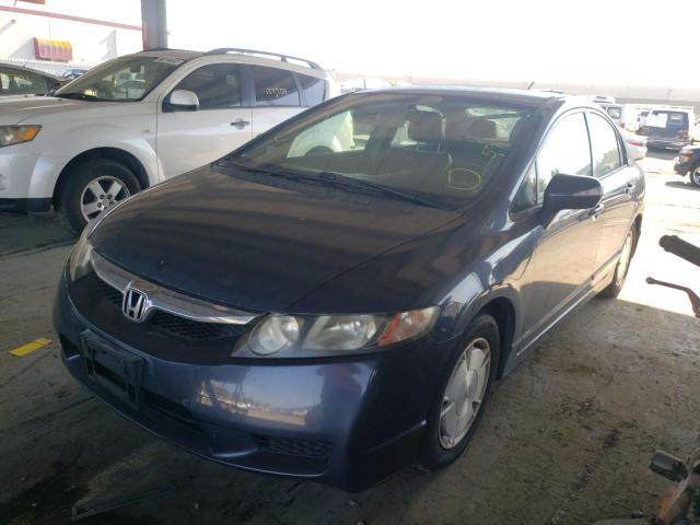 Photo 2 from auction – 2010 HONDA CIVIC HYBR with VIN JHMFA3F23AS003285
