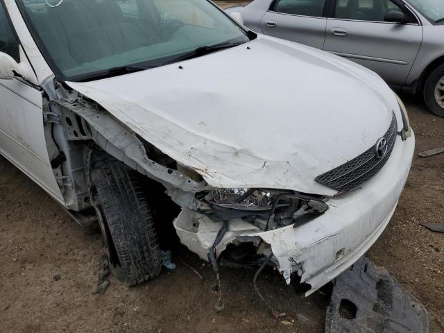 Photo 9 from auction – 2004 TOYOTA CAMRY LE with VIN JTDBE32K340267083