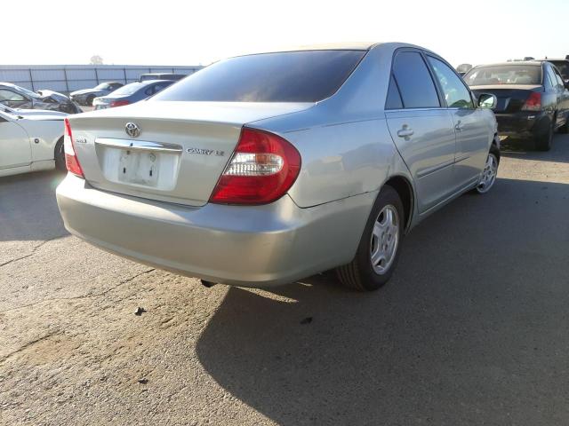 Photo 4 from auction – 2002 TOYOTA CAMRY LE with VIN JTDBE32KX20046593
