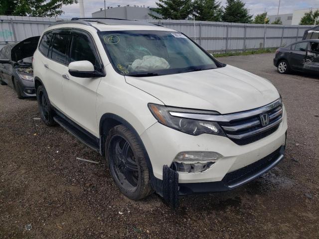 HONDA PILOT TOUR 2017 with VIN 5FNYF6H95HB507089 - Photo from auction