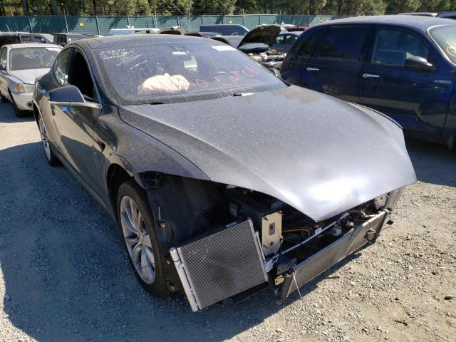 TESLA MODEL S 2014 with VIN 5YJSA1H24EFP63455 - Photo from auction