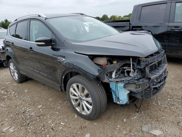FORD ESCAPE TIT 2017 with VIN 1FMCU9J93HUC99602 - Photo from auction