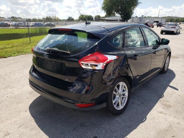 Photo 4 from auction – 2016 FORD FOCUS SE with VIN 1FADP3K25GL255559