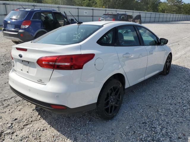 Photo 4 from auction – 2016 FORD FOCUS SE with VIN 1FADP3F25GL301871