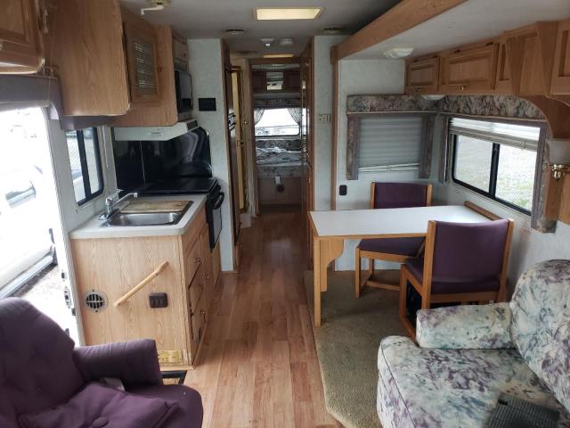 Photo 6 from auction – 1999 GEOR LANDAU with VIN 3FCMF53S6XJA13628