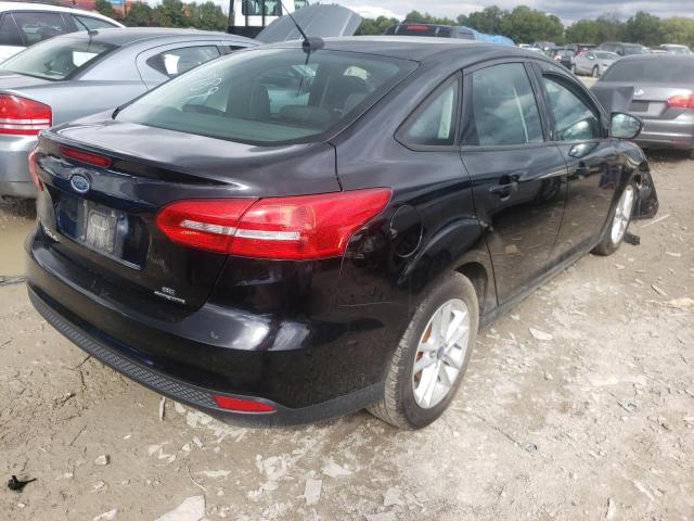 Photo 4 from auction – 2016 FORD FOCUS SE with VIN 1FADP3F29GL264789