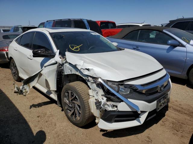HONDA CIVIC EX 2018 with VIN 2HGFC2F74JH509704 - Photo from auction