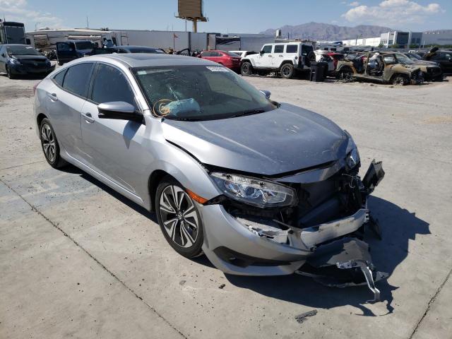 Photo 1 from auction – 2018 HONDA CIVIC EX with VIN JHMFC1F33JX007704