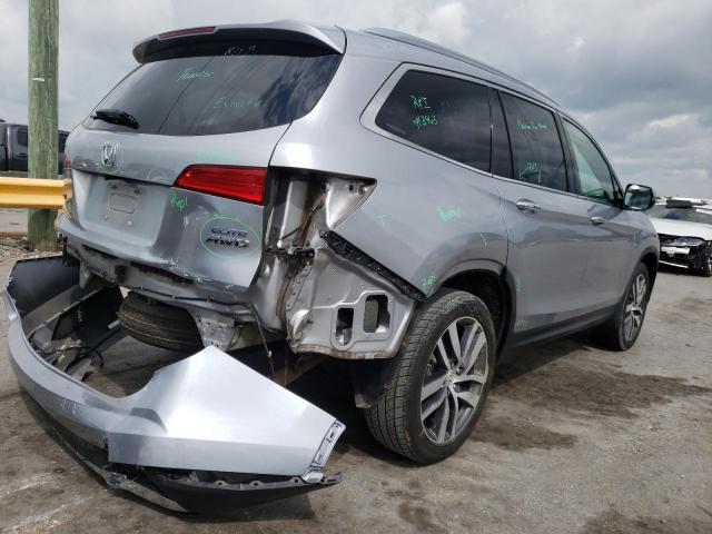 Photo 4 from auction – 2017 HONDA PILOT ELIT with VIN 5FNYF6H04HB062085