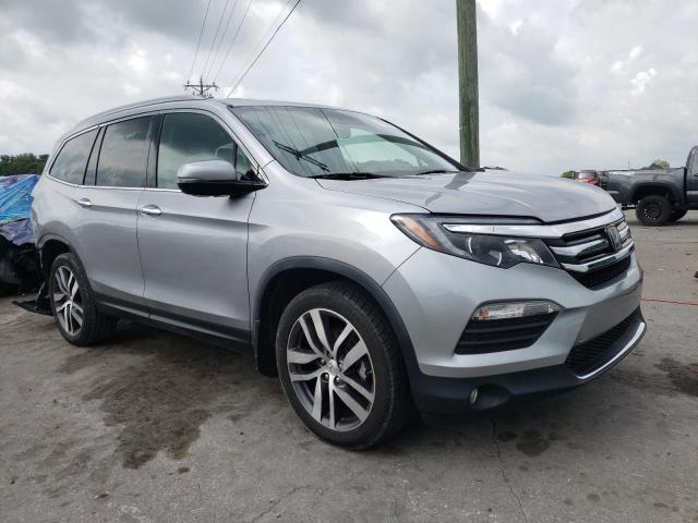 HONDA PILOT ELIT 2017 with VIN 5FNYF6H04HB062085 - Photo from auction