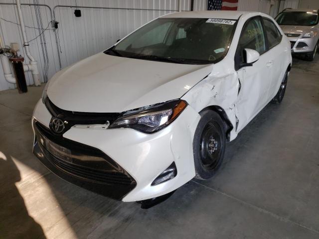 Photo 2 from auction – 2017 TOYOTA COROLLA L with VIN 5YFBURHE0HP624139