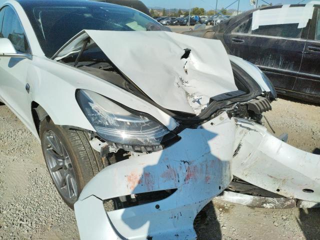 Photo 9 from auction – 2018 TESLA MODEL 3 with VIN 5YJ3E1EA3JF026293