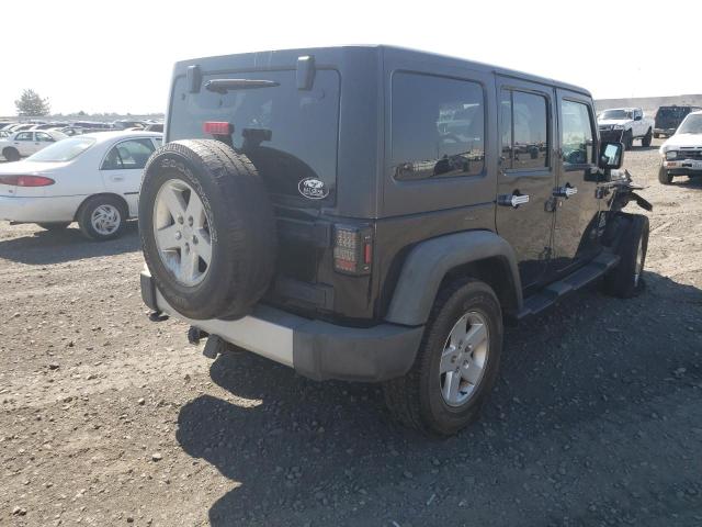 Photo 4 from auction – 2011 JEEP WRANGLER U with VIN 1J4BA3H16BL553266