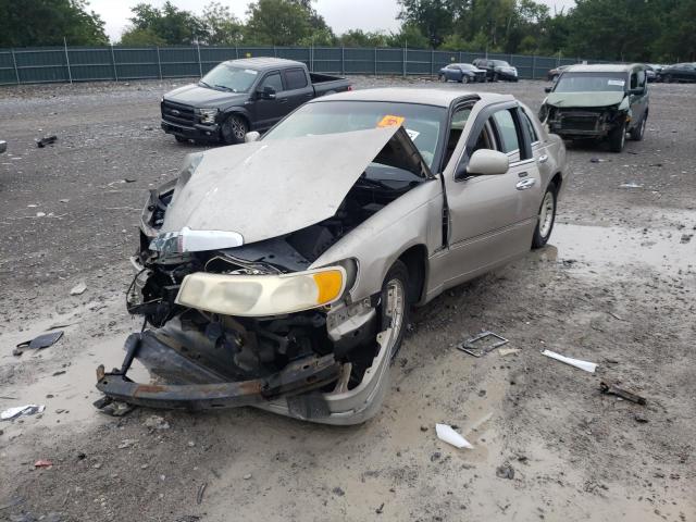 Photo 2 from auction – 2000 LINCOLN TOWN CAR E with VIN 1LNHM81W5YY937721