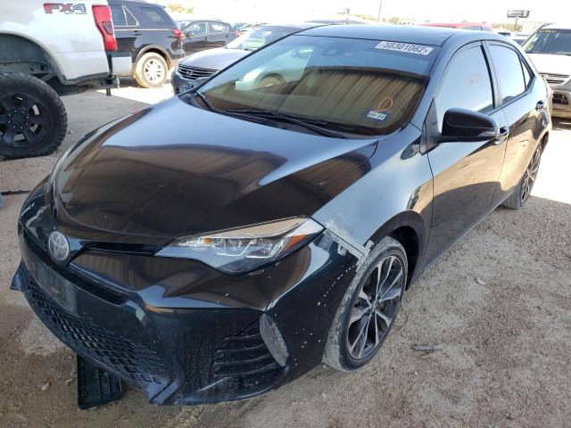 Photo 2 from auction – 2017 TOYOTA COROLLA L with VIN 5YFBURHE0HP642740
