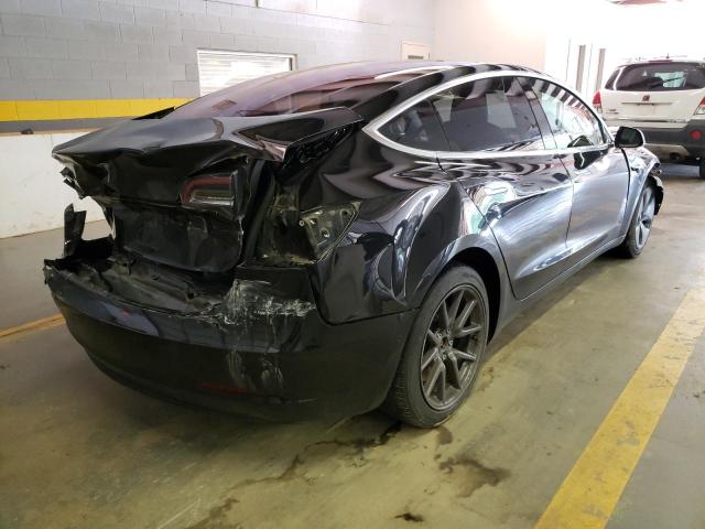 Photo 4 from auction – 2017 TESLA MODEL 3 with VIN 5YJ3E1EA5HF000577