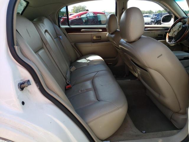 Photo 6 from auction – 2004 LINCOLN TOWN CAR U with VIN 1LNHM83W44Y678534
