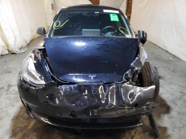 Photo 7 from auction – 2021 TESLA MODEL 3 with VIN 5YJ3E1EC1MF035483