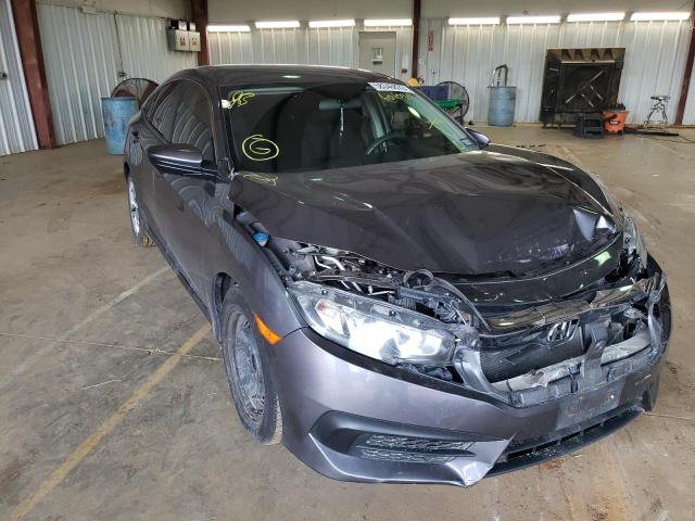 HONDA CIVIC LX 2018 with VIN 2HGFC2F58JH601090 - Photo from auction