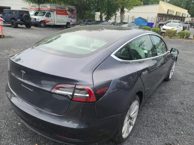 Photo 4 from auction – 2020 TESLA MODEL 3 with VIN 5YJ3E1EA4LF741201