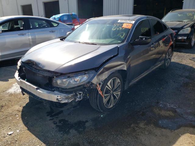 Photo 2 from auction – 2016 HONDA CIVIC EXL with VIN 2HGFC1F78GH659995