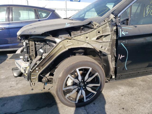 Photo 9 from auction – 2021 HONDA PILOT TOUR with VIN 5FNYF5H95MB020172