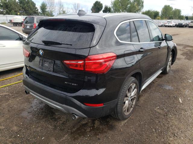 Photo 4 from auction – 2018 BMW X1 XDRIVE2 with VIN WBXHT3C30J3H31776