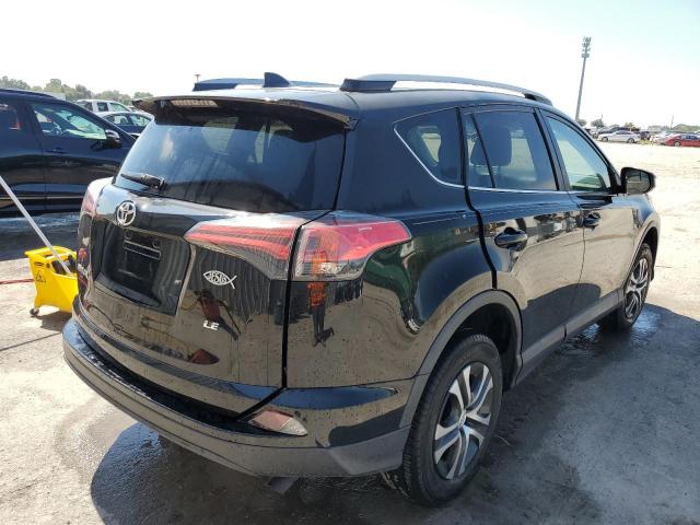 Photo 4 from auction – 2018 TOYOTA RAV4 LE with VIN 2T3ZFREVXJW504552