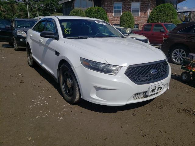 FORD TAURUS POL 2014 with VIN 1FAHP2MK7EG185335 - Photo from auction