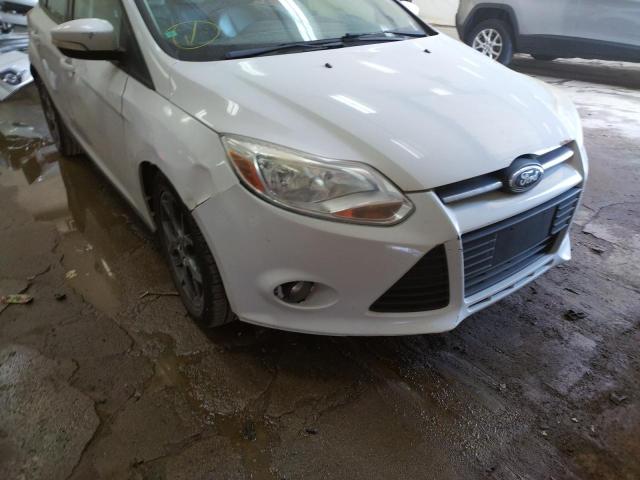 Photo 9 from auction – 2013 FORD FOCUS SE with VIN 1FADP3K20DL247557