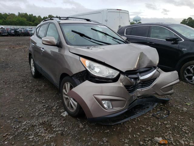 HYUNDAI TUCSON GLS 2012 with VIN KM8JUCAC7CU383656 - Photo from auction