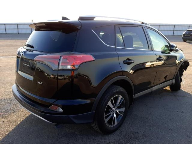 Photo 4 from auction – 2016 TOYOTA RAV4 XLE with VIN 2T3WFREV9GW279133
