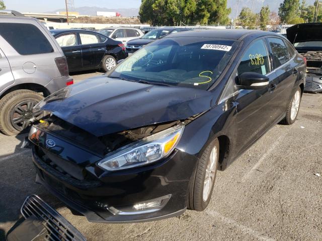 Photo 2 from auction – 2016 FORD FOCUS TITA with VIN 1FADP3J24GL263010