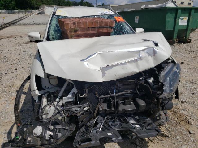 Photo 9 from auction – 2015 NISSAN ROGUE S with VIN 5N1AT2MV5FC848584