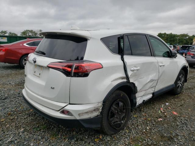Photo 4 from auction – 2018 TOYOTA RAV4 LE with VIN 2T3ZFREV5JW512557