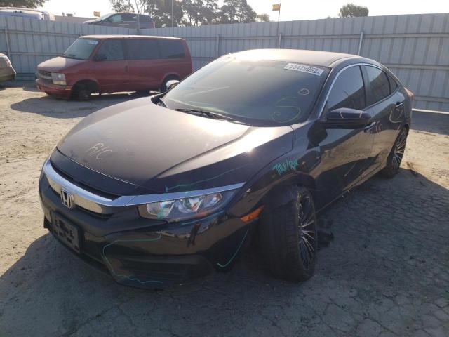 Photo 2 from auction – 2018 HONDA CIVIC LX with VIN 2HGFC2F54JH510186