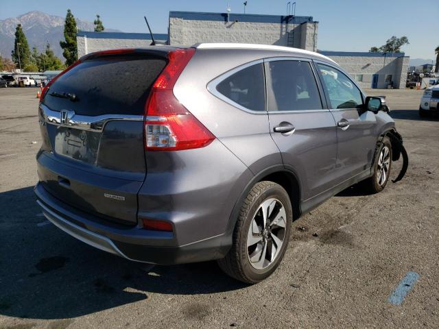 Photo 4 from auction – 2016 HONDA CR-V TOURI with VIN 5J6RM3H95GL010798