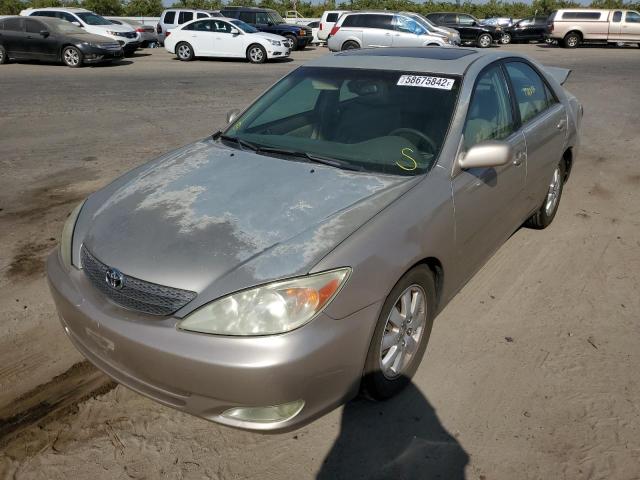 Photo 2 from auction – 2004 TOYOTA CAMRY LE with VIN 4T1BF30K54U074907
