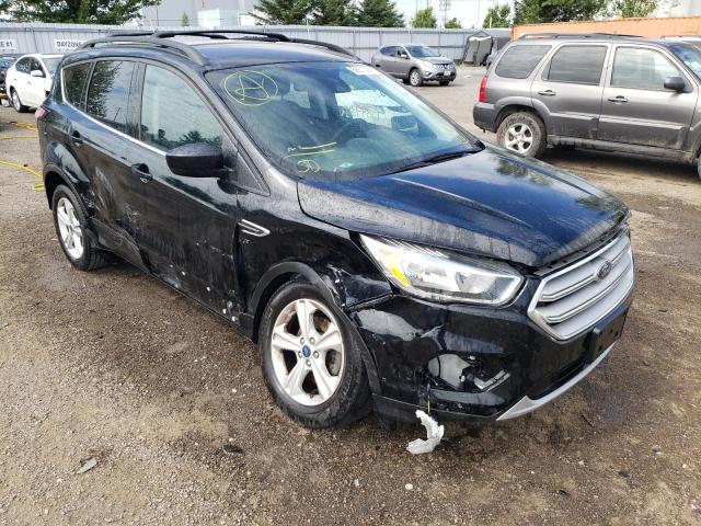 FORD ESCAPE SE 2018 with VIN 1FMCU0GD0JUB63635 - Photo from auction