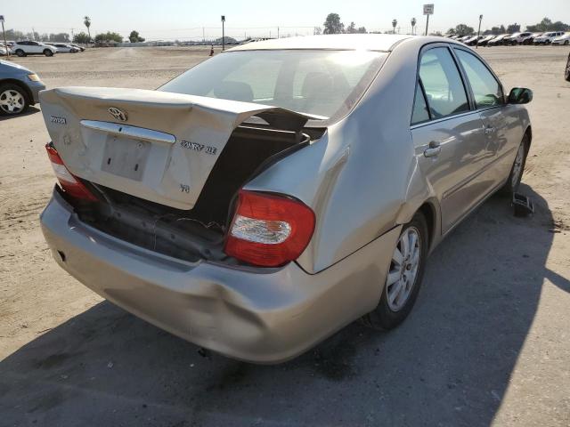 Photo 4 from auction – 2004 TOYOTA CAMRY LE with VIN 4T1BF30K54U074907