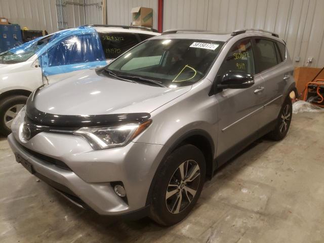 Photo 2 from auction – 2017 TOYOTA RAV4 XLE with VIN 2T3RFREV5HW584160