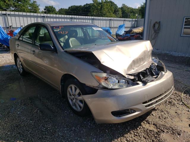 TOYOTA CAMRY LE 2002 with VIN JTDBF32K920006275 - Photo from auction