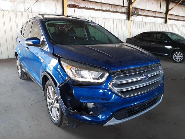 FORD ESCAPE TIT 2017 with VIN 1FMCU0J96HUB44781 - Photo from auction