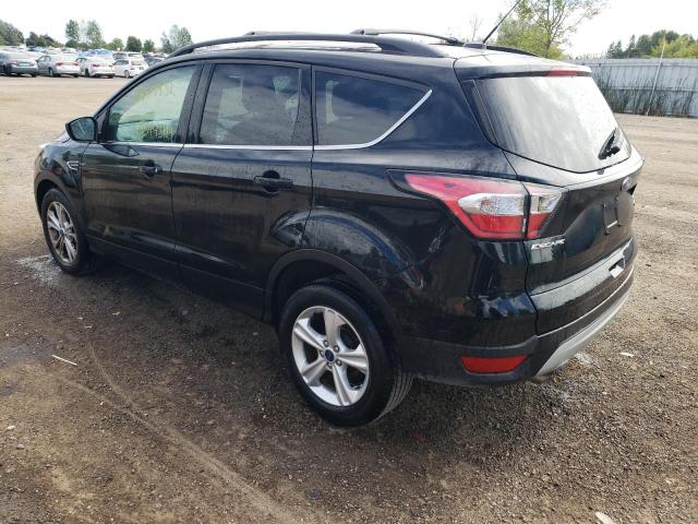 Photo 3 from auction – 2018 FORD ESCAPE SE with VIN 1FMCU0GD0JUB63635